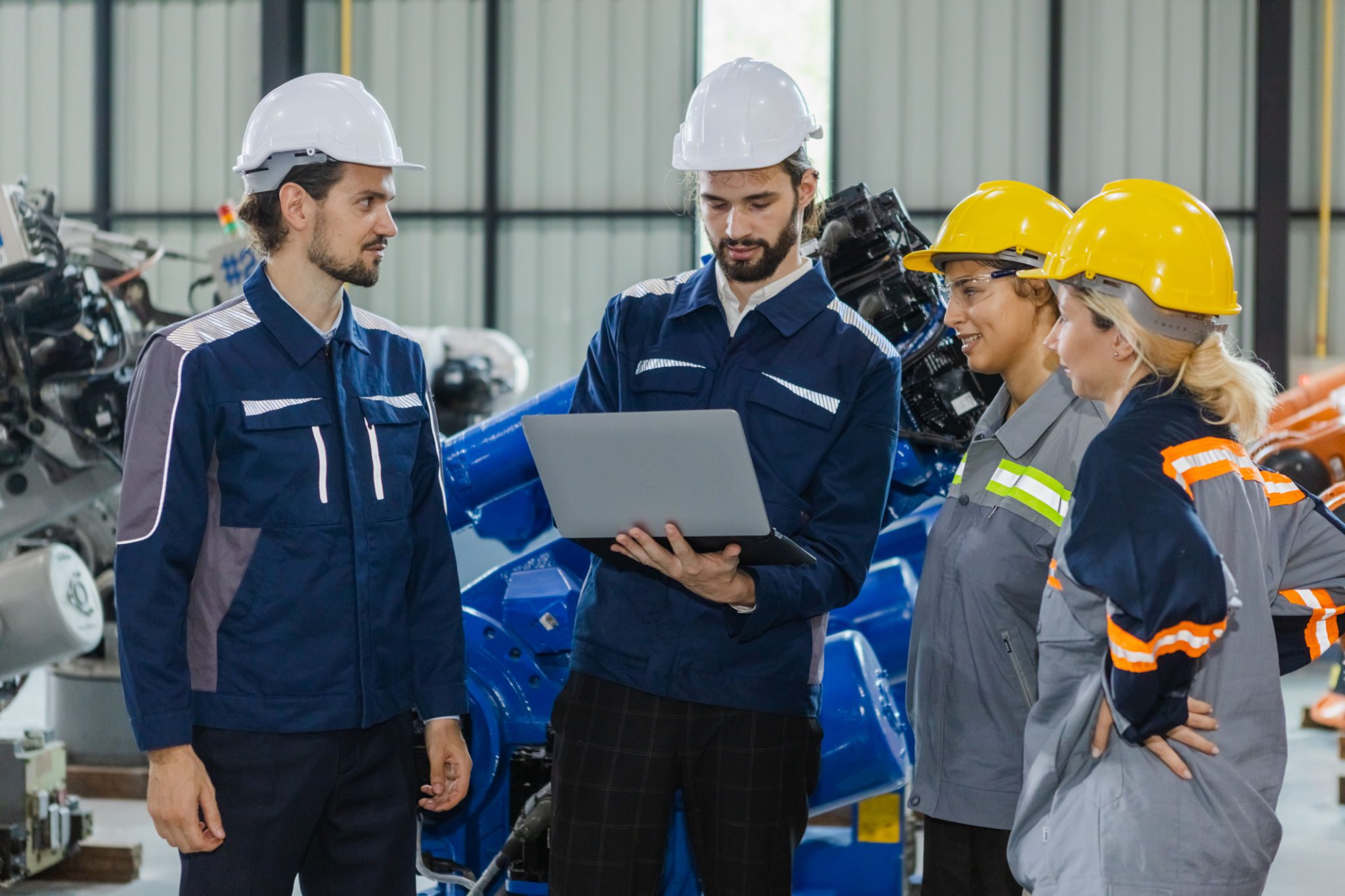 Team meeting in industrial setting